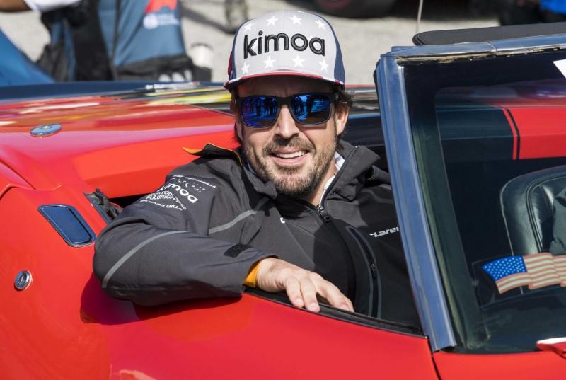 Racing driver  Alonso and Johnson to swap cars at end of F1 season