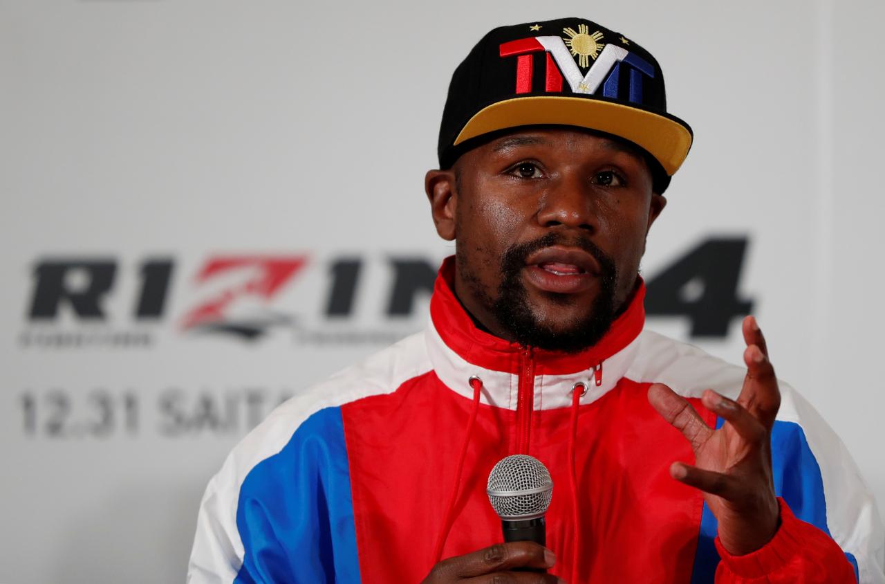 Boxer Floyd Mayweather and 'DJ Khaled' charged by SEC over token offerings