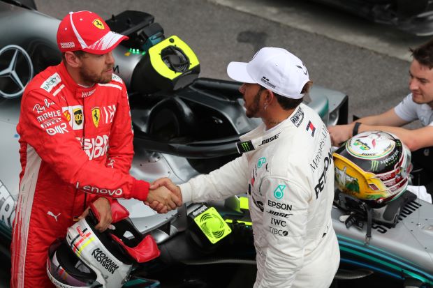 Hamilton on pole in Brazil, Vettel alongside