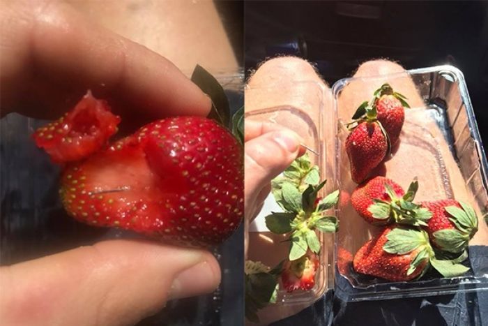 Australian woman charged with contaminating strawberries with needles