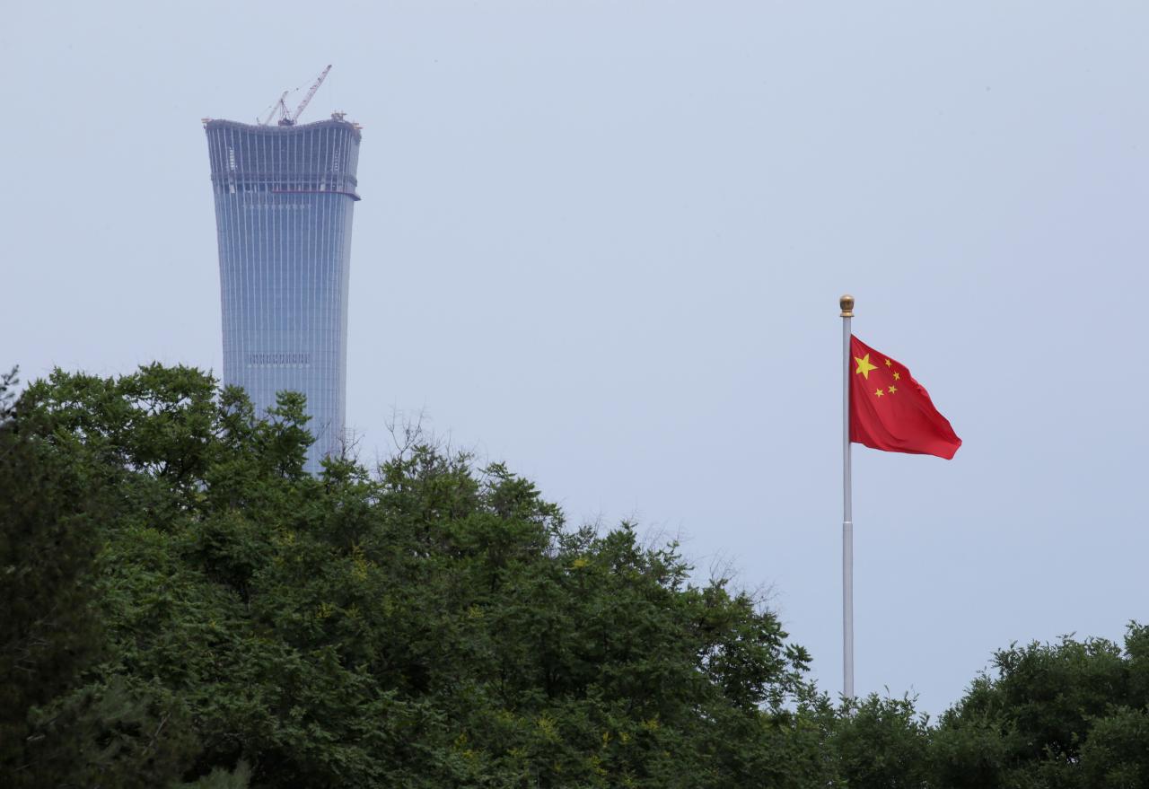 China denies 'slanderous' economic espionage charges from US, allies