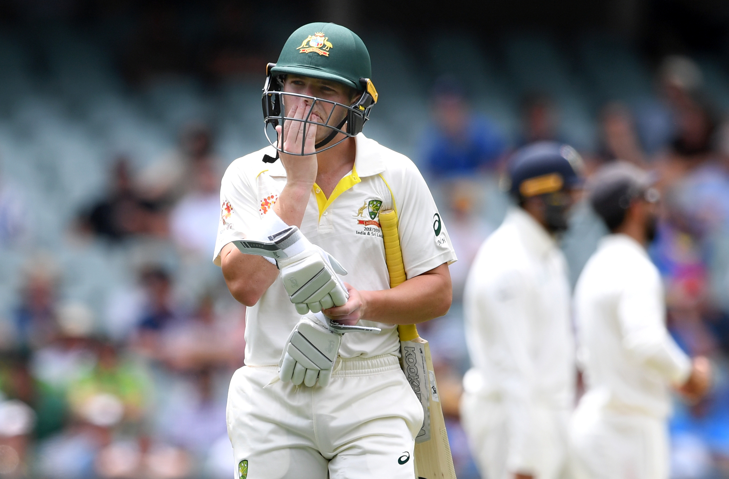 Travis Head holds on to give Australia hope in first Test