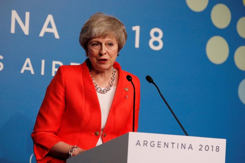 Hoping to win Brexit support, May says world leaders ready for trade