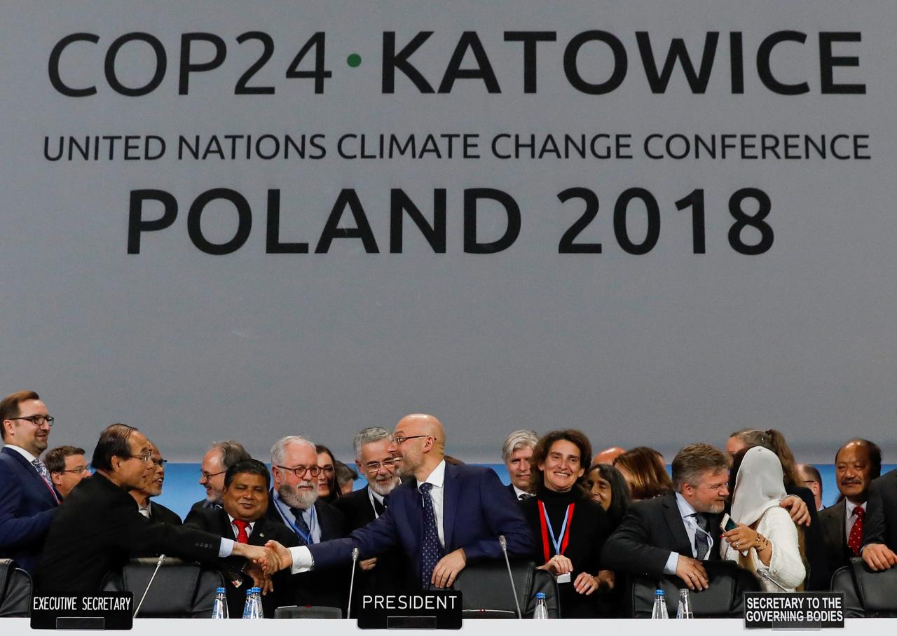 Nations agree on global climate pact rules, but they are seen as weak