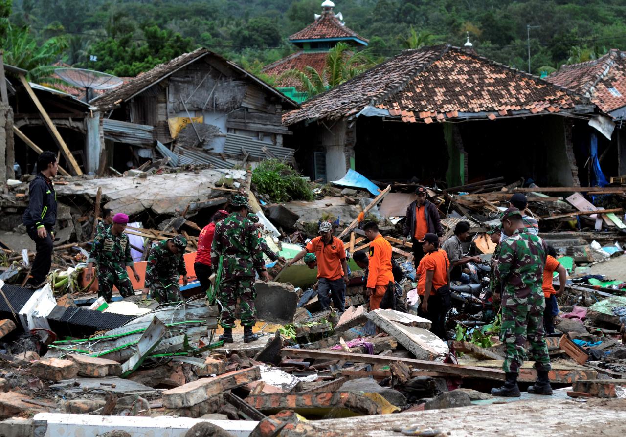 Rescuers dig through rubble for survivors after Indonesian tsunami kills 280