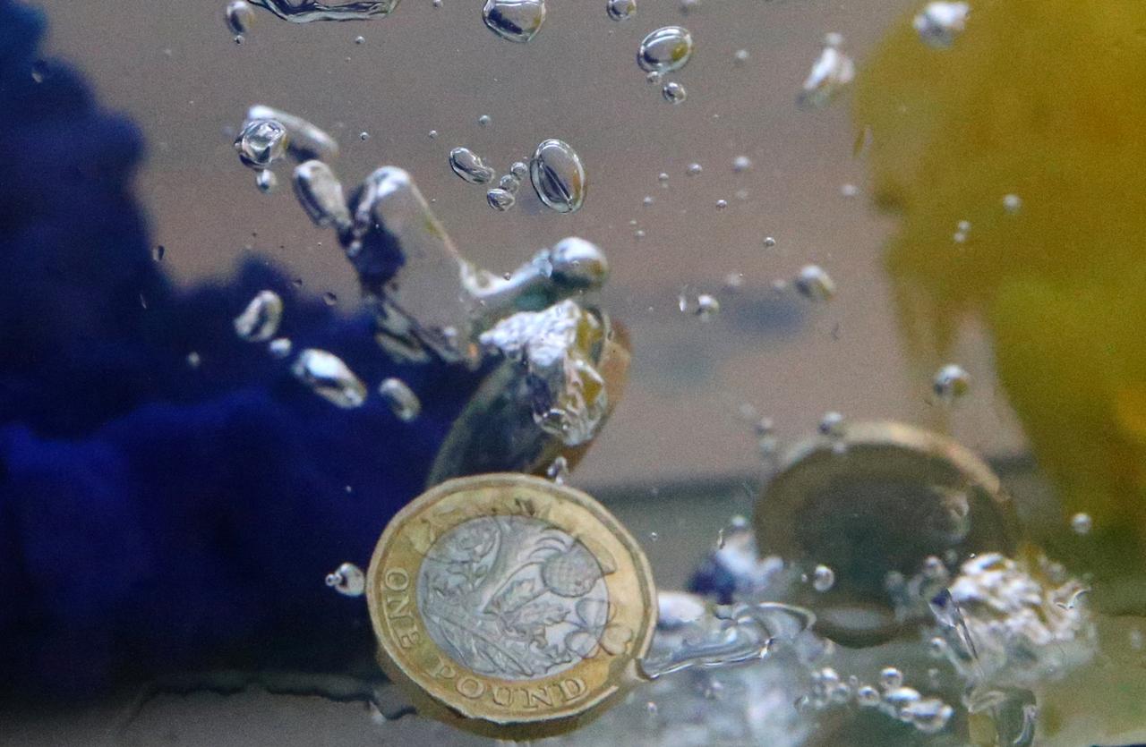 Sterling sinks after MPs reject way to prevent no-deal Brexit