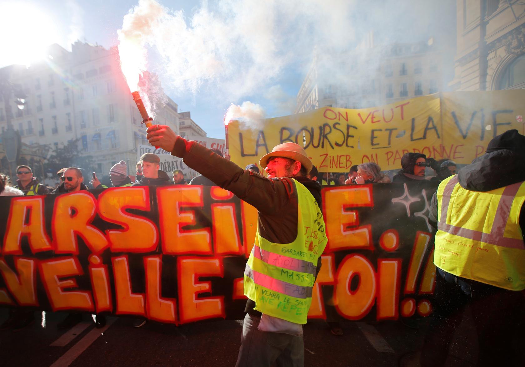 French 'yellow vests' defy Macron with fresh protests