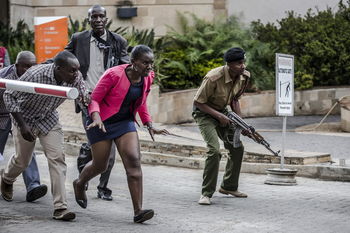 Gunmen storm Kenyan hotel compound, Somali militants claim lethal attack