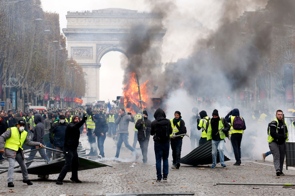 Yellow vest protests hit with police water cannon, tear gas in Paris