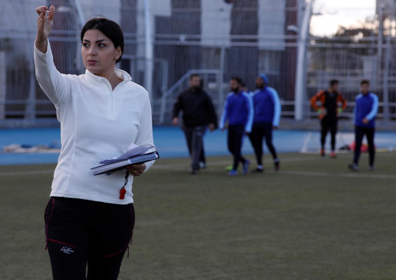 Woman soccer coach scores wins for Syrian men's team