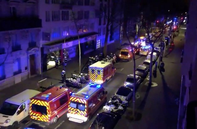 Blaze kills nine in Paris apartment block, woman arrested