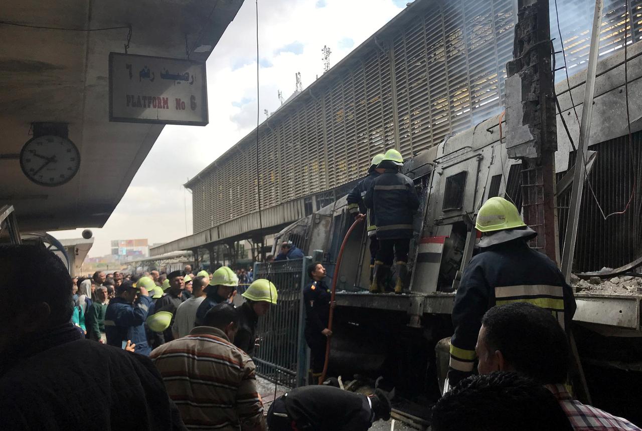 Dozens killed and injured in crash and fire at Cairo train station