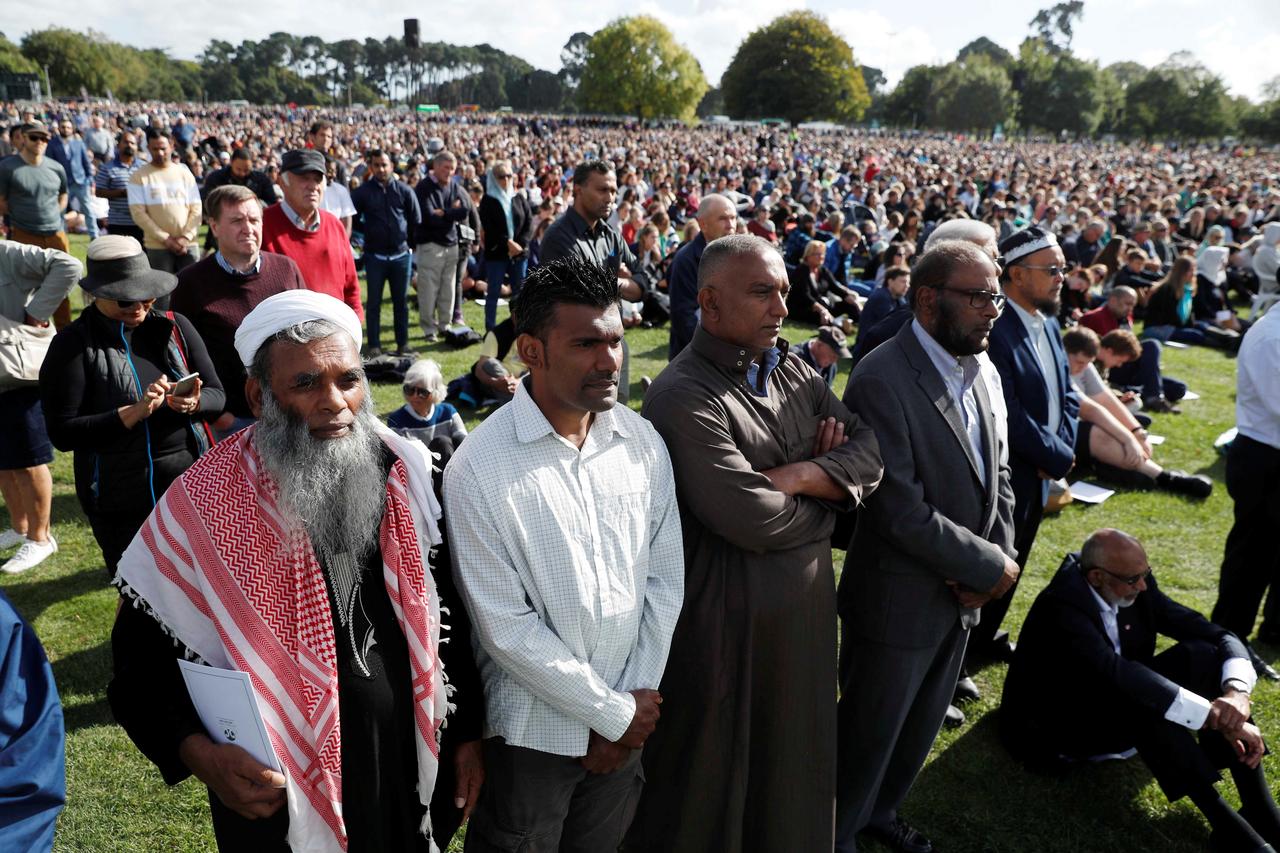 Silent crowd listens to mosque victims' names at New Zealand memorial