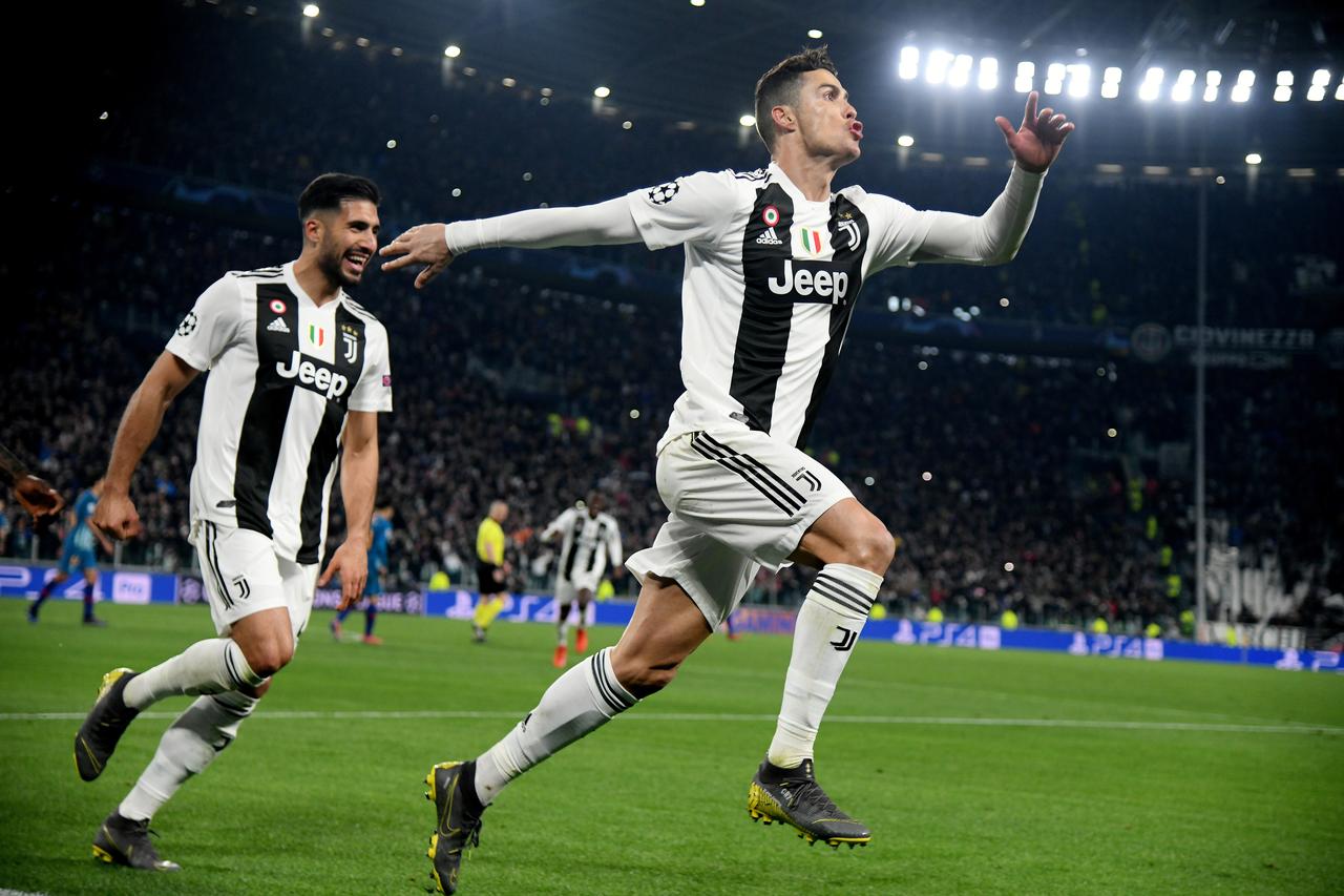 Ronaldo hat-trick leads Juve into Champions League quarter-finals