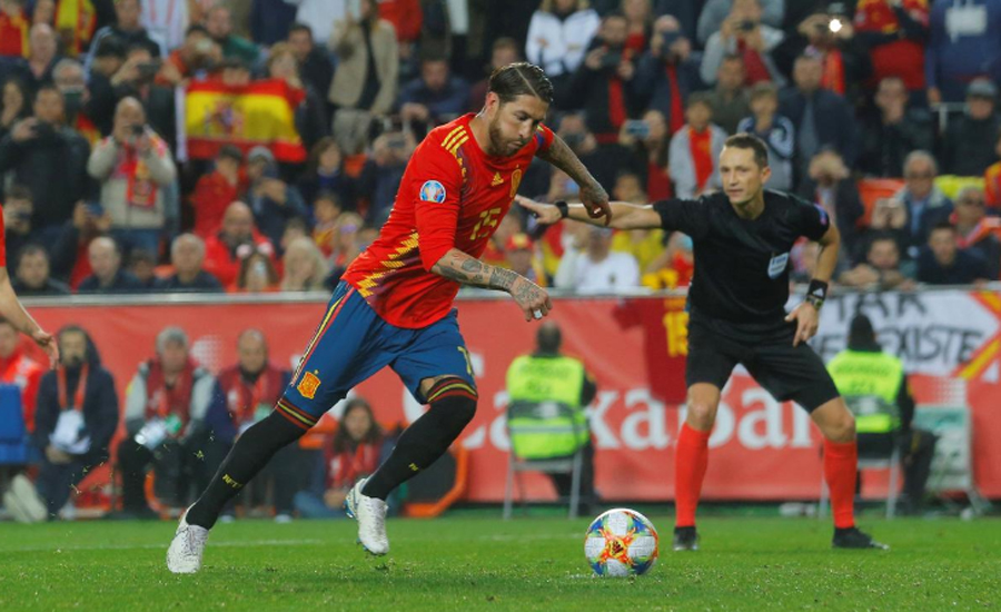 Nerveless Ramos gives Spain winning start