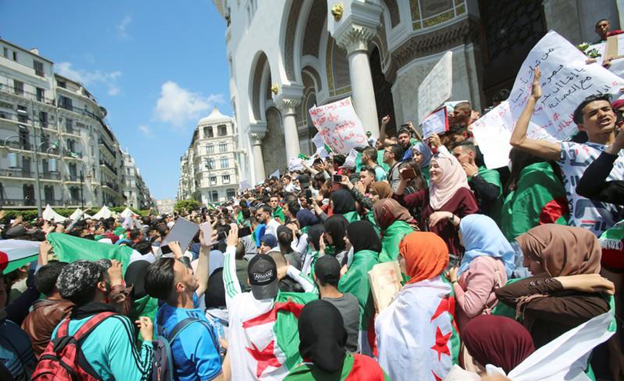 Tens of thousands protest against Algeria's ruling elite