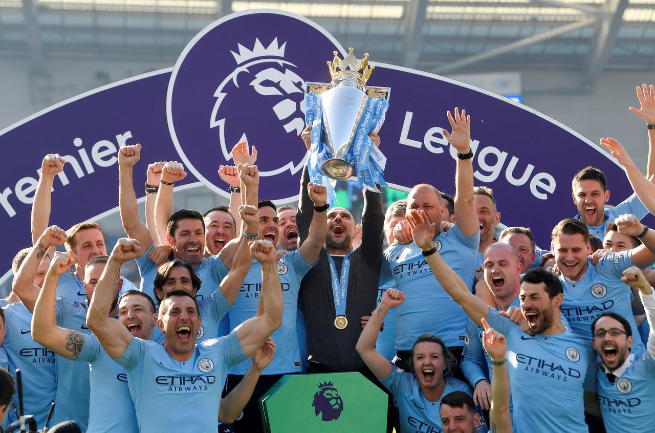Manchester City survive scare to retain Premier League title in style