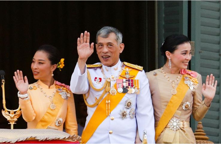 Thai king greets crowd of flag-waving subjects on final day of coronation
