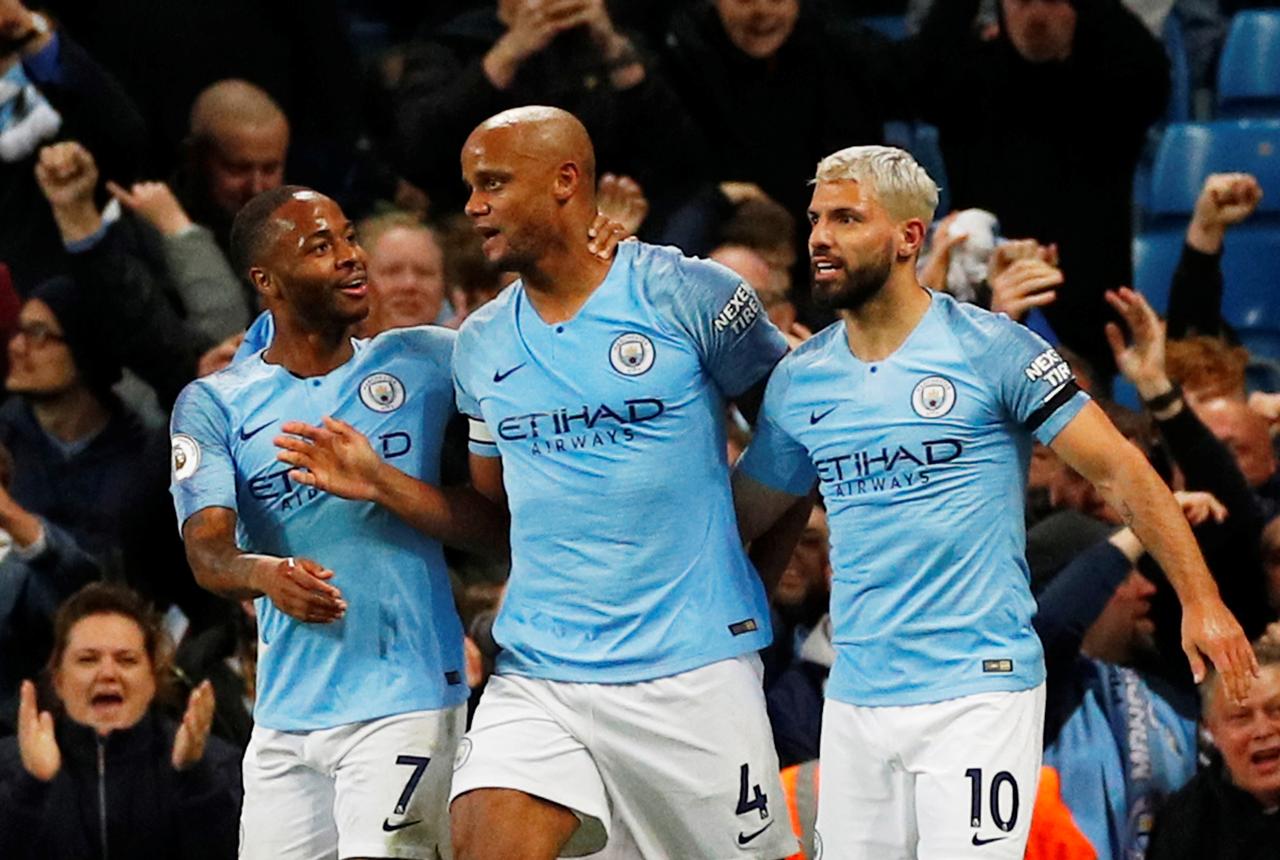 Kompany stunner moves Manchester City one win away from title