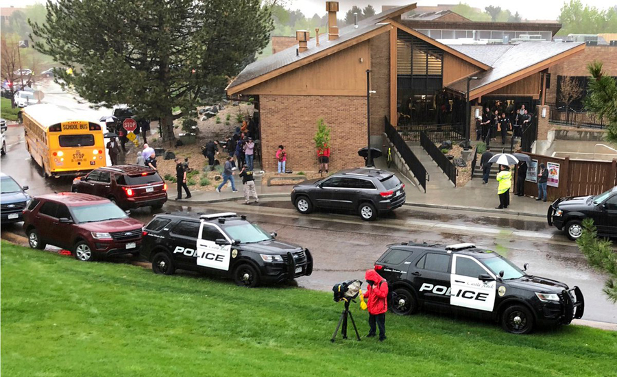 Two students open fire at Colorado school, killing one, wounding seven