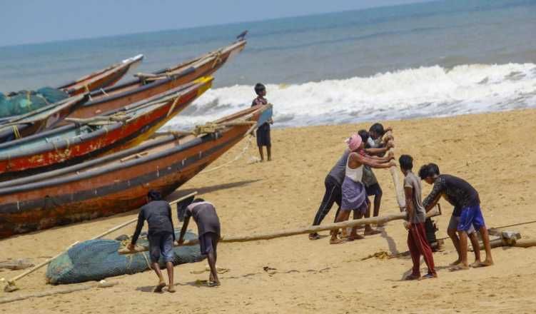 India launches mass evacuation, warns tourists, as cyclone bears down on east coast