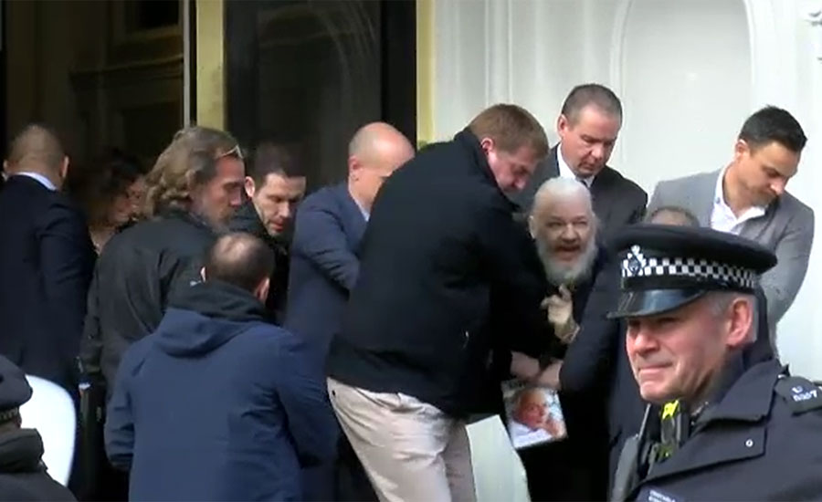 Julian Assange sentenced to 50 weeks in British jail for skipping bail