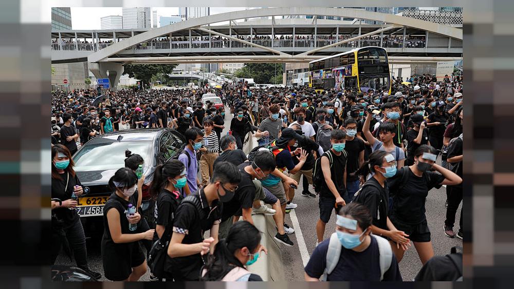 Black-clad protesters demand full withdrawal of Hong Kong extradition bill