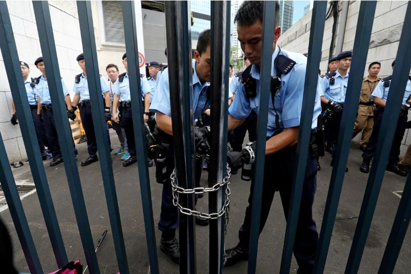 Fate of 24 arrested Hong Kong protesters hangs in balance as anger turns on police