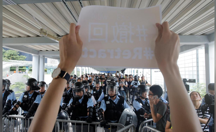 Hong Kong shuts city offices, security tight after protests
