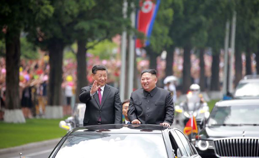 'I Love Thee, China' - North Korea woos Xi in lavish state visit