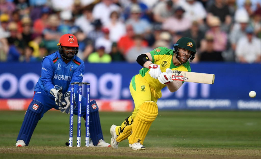 Australia steer past spirited Afghanistan to kick-start title defence