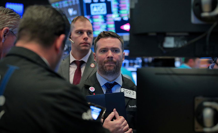 Global stocks dip as Fed meeting looms, oil climbs on geopolitical fears