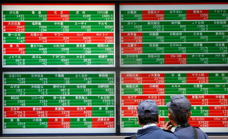 Asia stocks gain, dollar droops as Fed chair sets stage for rate cut