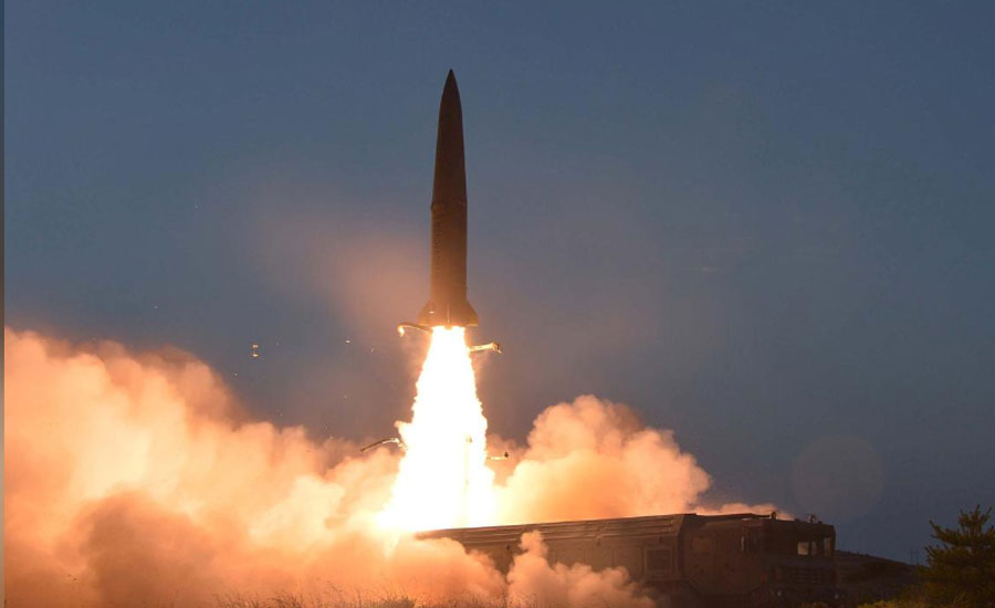 North Korea's Kim says missile test  warning to South Korean warmongers