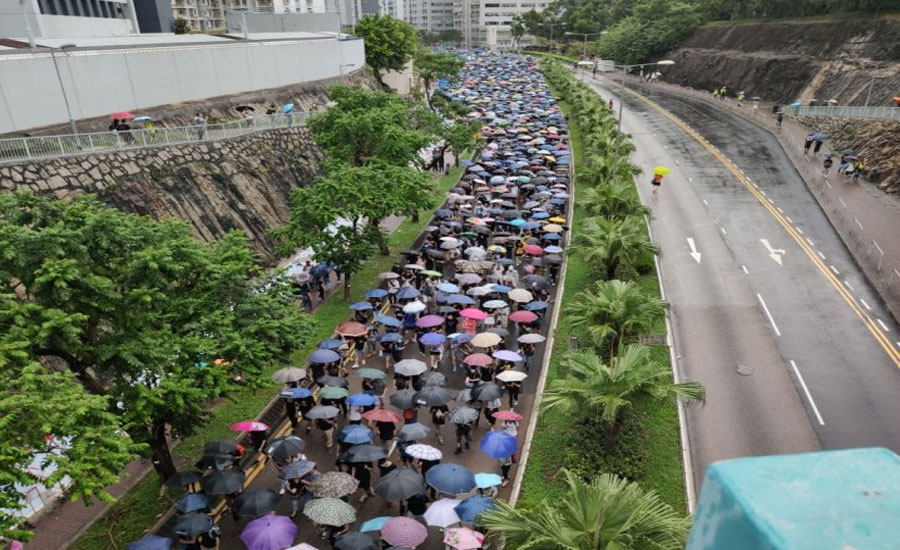 Protesters again rally against govt under stormy skies in Hong Kong