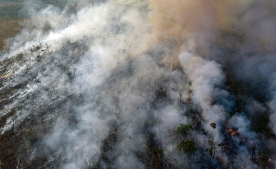 Warplanes dump water on Amazon as Brazil military begins fighting fires