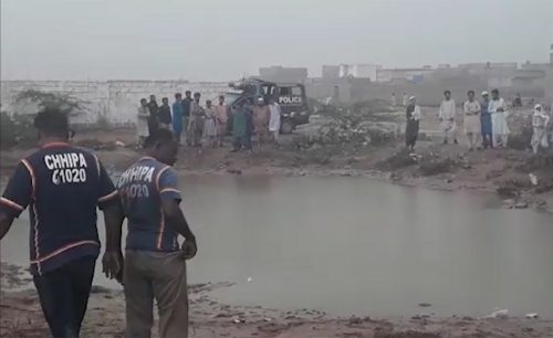 Three, brothers, drown, drains, overflow, light, rain, Karachi