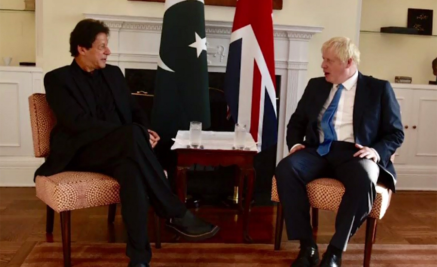 PM Imran Khan meets with UK counterpart, apprises him of rights violations in IOK
