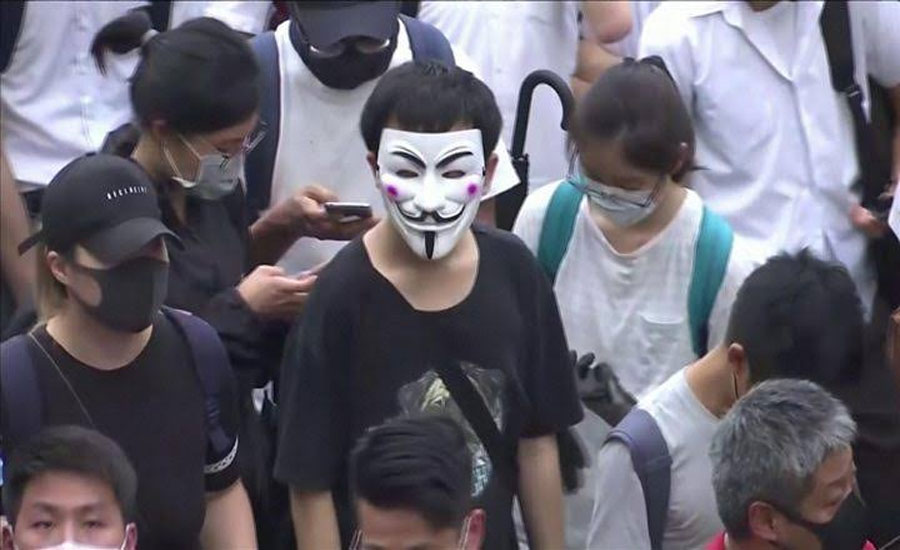 Thousands stage protest to defy face mask ban in Hong Kong