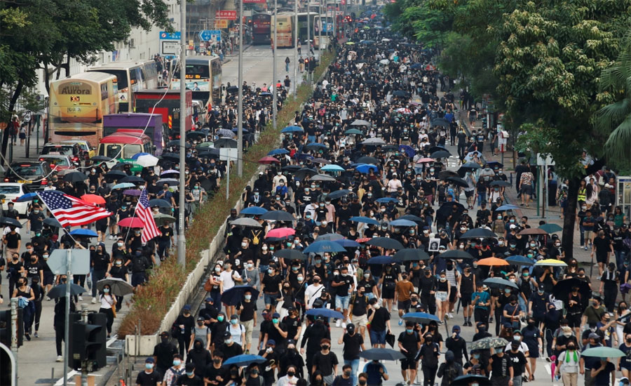 Hong Kong: Protesters rally defying mask ban, petrol bombs thrown in metro