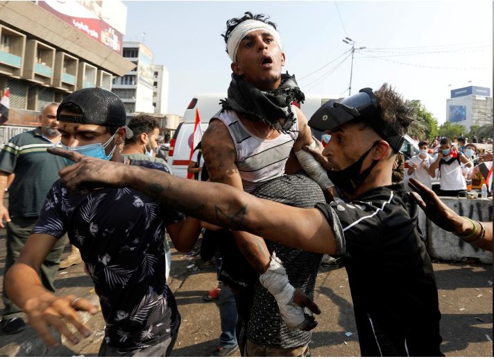 Iraqi security forces open fire on protesters, kill 14