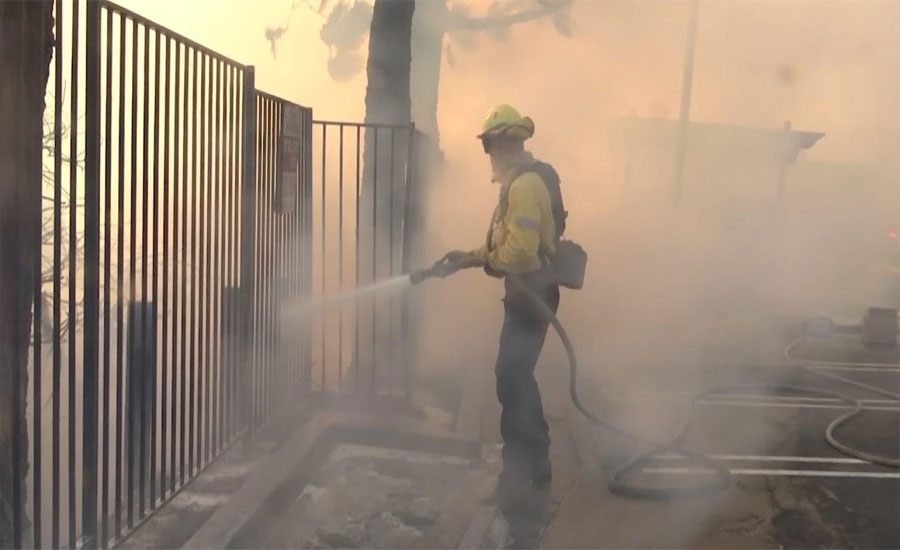 Firefighters battle southern California wildfire blazes