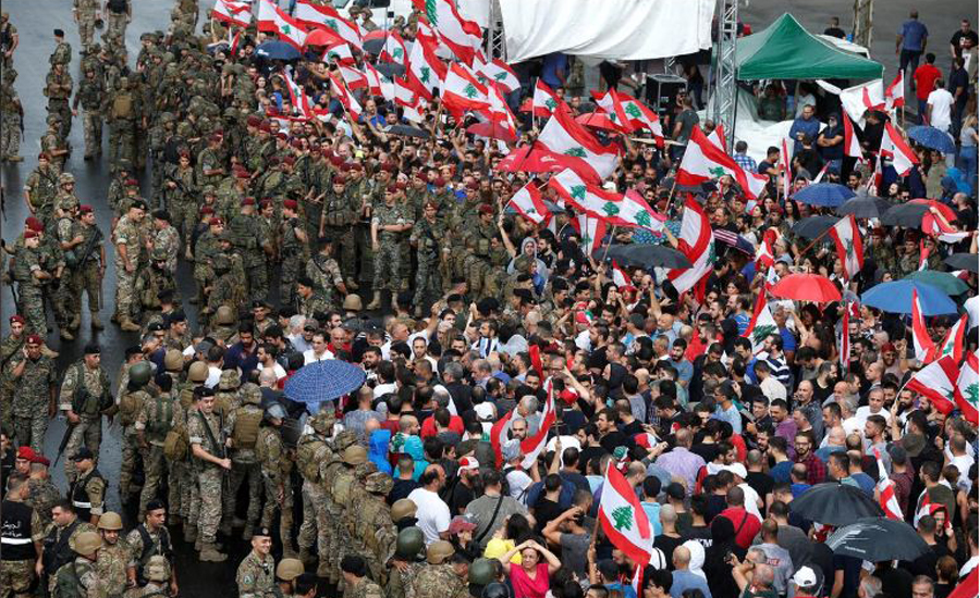 Facing protests, Lebanese leaders mull reshuffle: sources