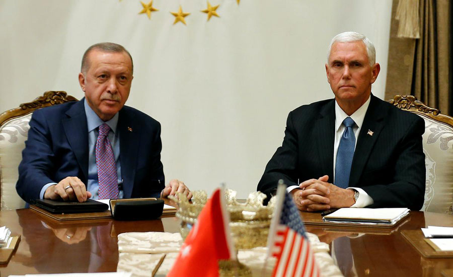 Turkey agrees with US to pause Syria assault while Kurds withdraw