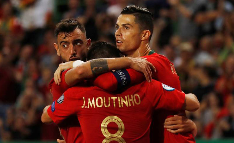 Portugal and Ukraine close in on Euro 2020 with home wins