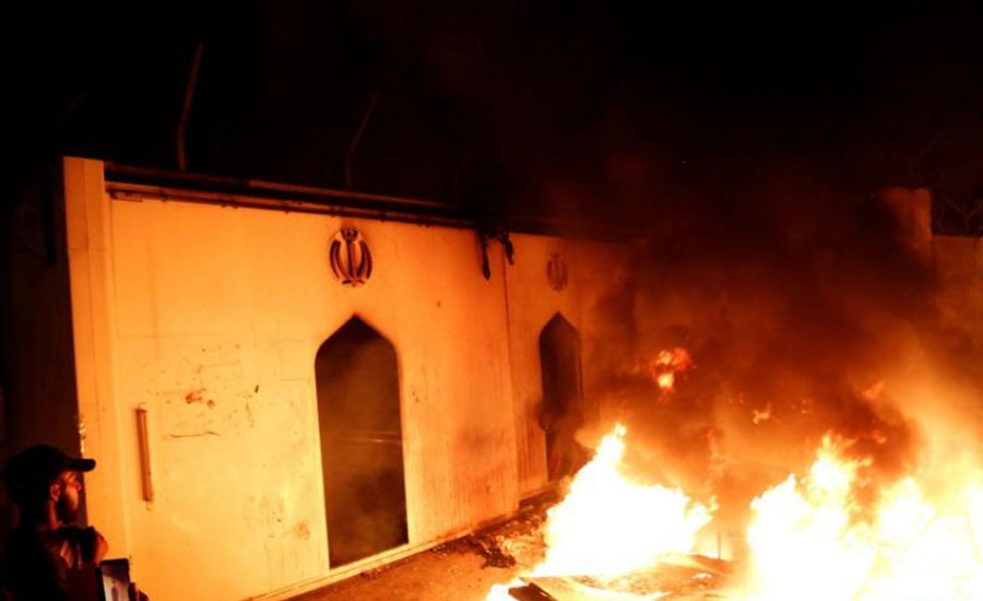 Iraq protesters torch Iran consulate in Najaf, curfew imposed