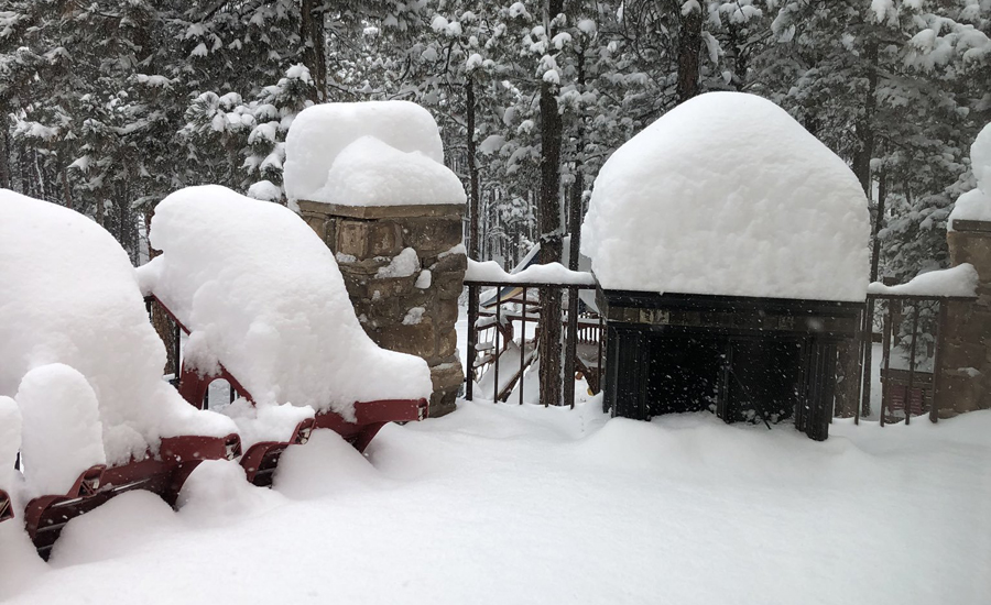 Colorado blizzard shuts roads, cancels flights on one of busiest travel days