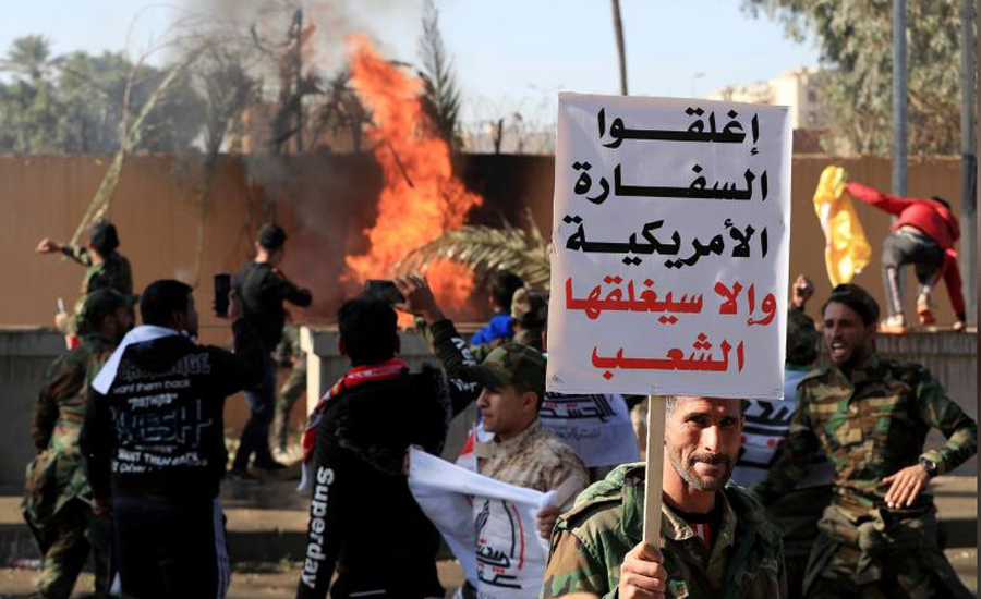 US embassy in Baghdad evacuated as protesters denounce air strikes