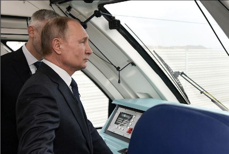 Putin opens Russian rail route to annexed Crimea