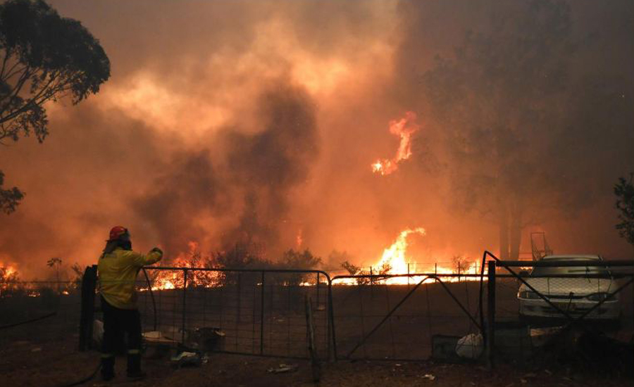 Australian state declares emergency as wildfires surround Sydney